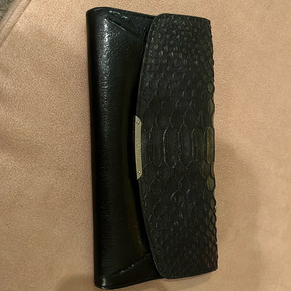 Coach black wallet with gold tag